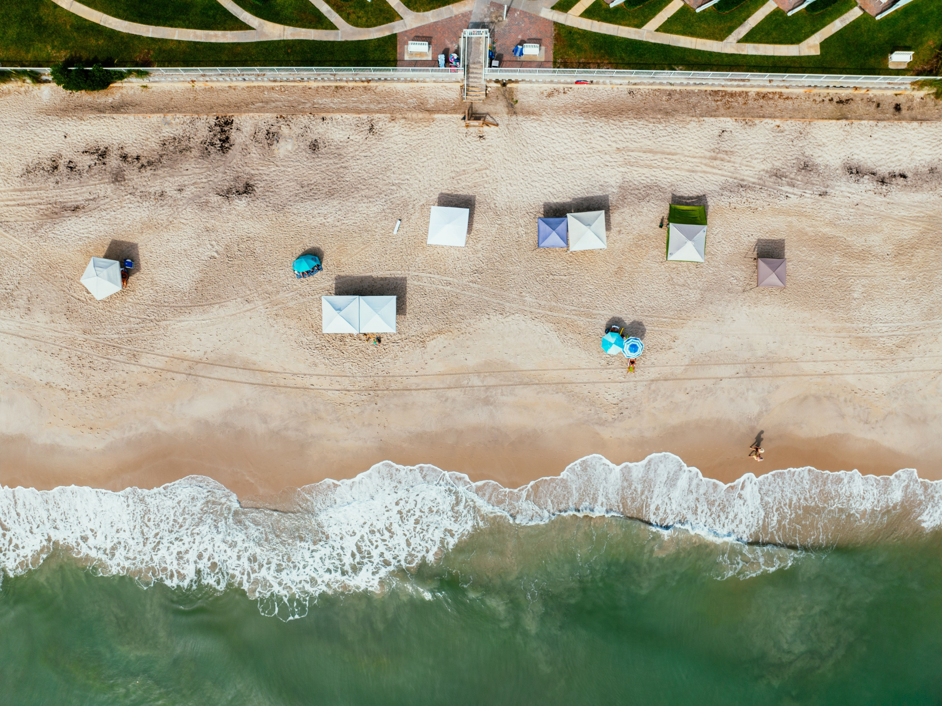 Aerial view of Vero Beach coastline with beach umbrellas
